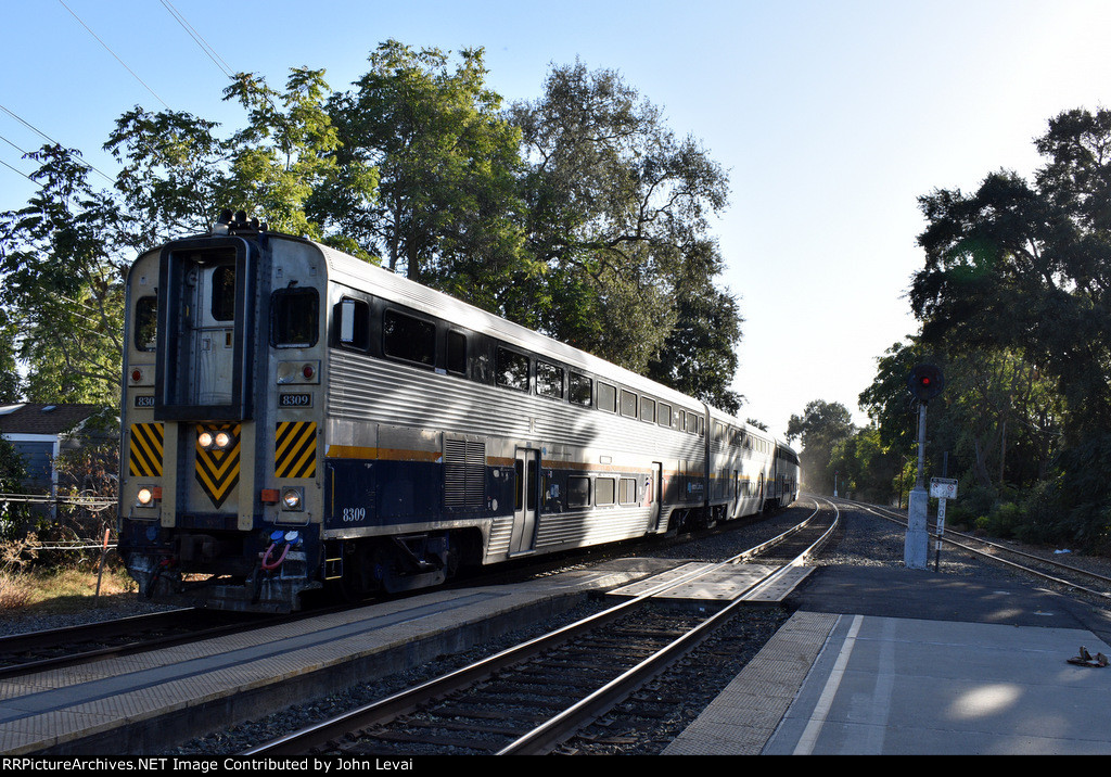 Amtrak Train # 736 arriving into the beautiful Davis Station with California Car # 8309 leading 